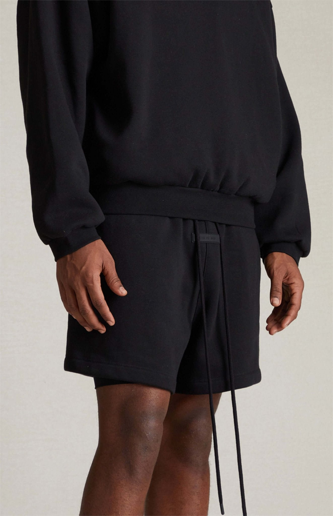 Shorts Essentials Fear of God "Jet Black Fleece Running" Preto - LK Sneakers - 160SP242004F - 1