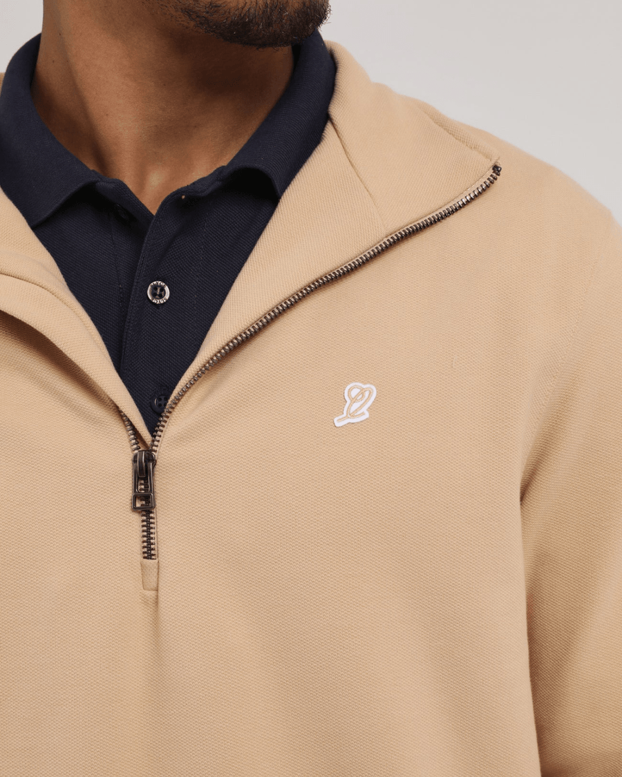 Vista do solado Blusa Slyce Classics Piquet Quarter Zip Bege