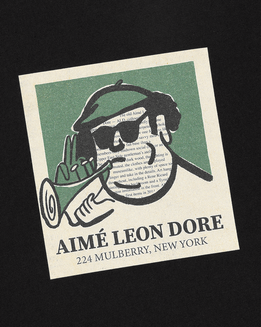 Vista lateral Camiseta Aimé Leon Dore Musician Graphic Preta