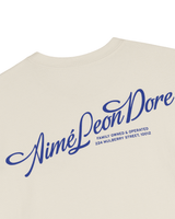 Vista traseira Camiseta Aimé Leon Dore Pappoús Logo Pristine Off White