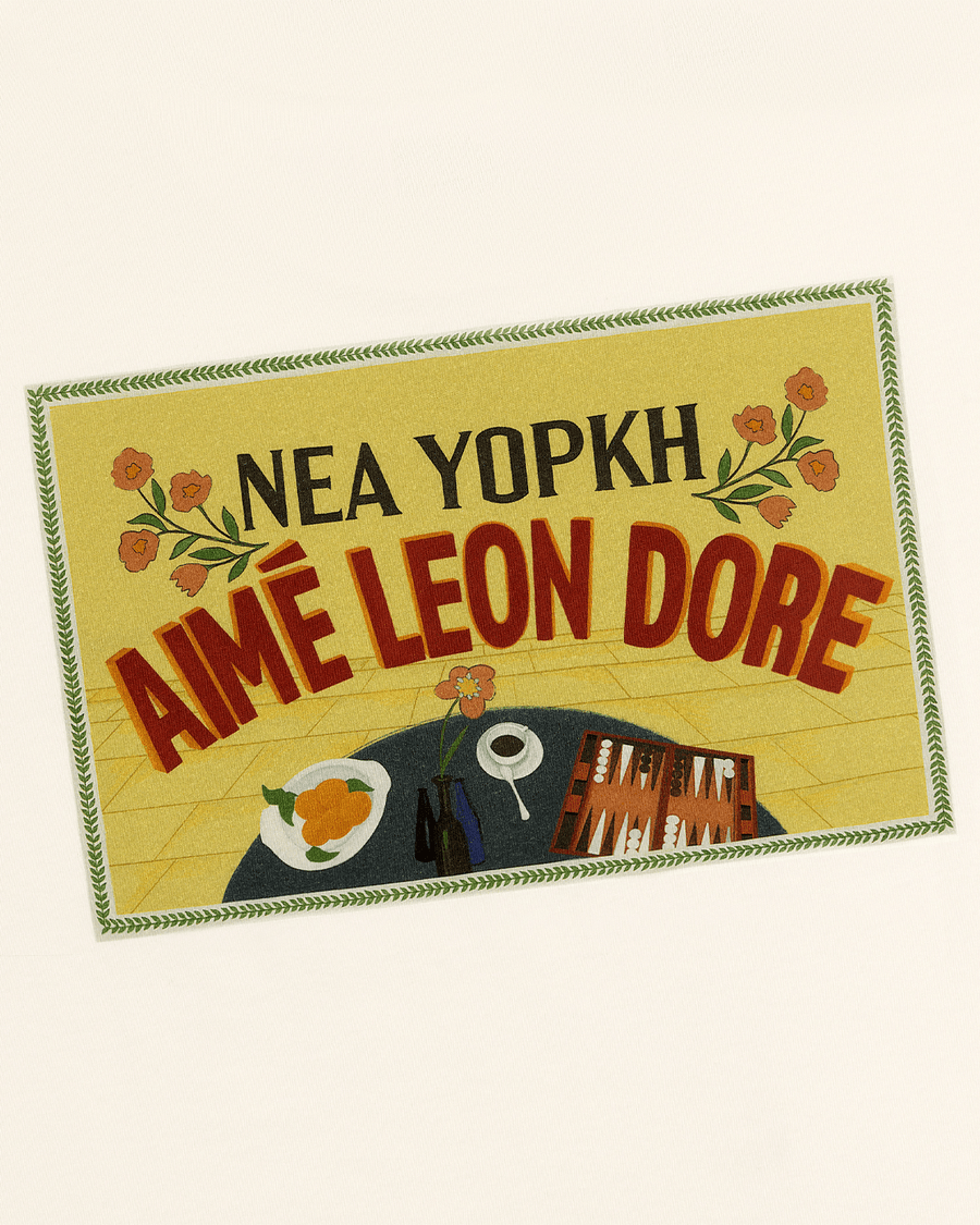 Camiseta Aimé Leon Dore Postcard Cream Bege
