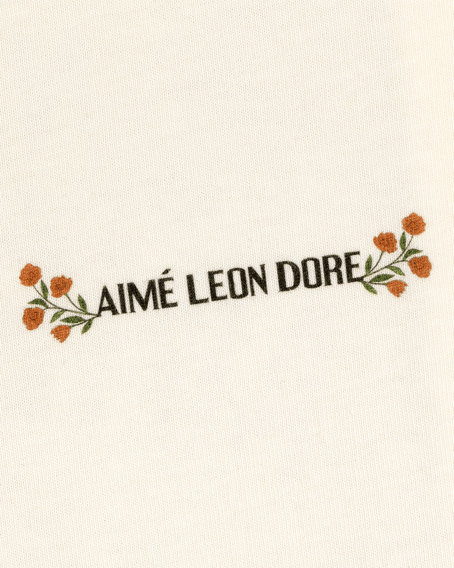 Camiseta Aimé Leon Dore Postcard Cream Bege