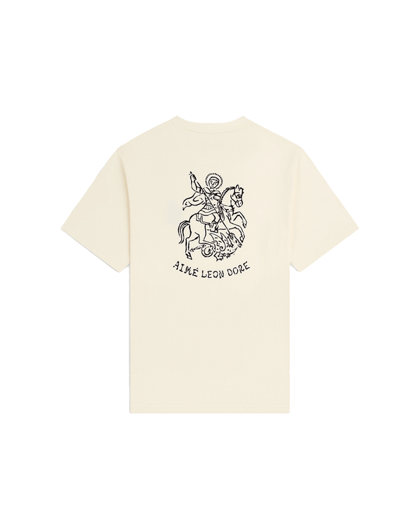 Camiseta Aimé Leon Dore Saint George Coconut Milk Bege