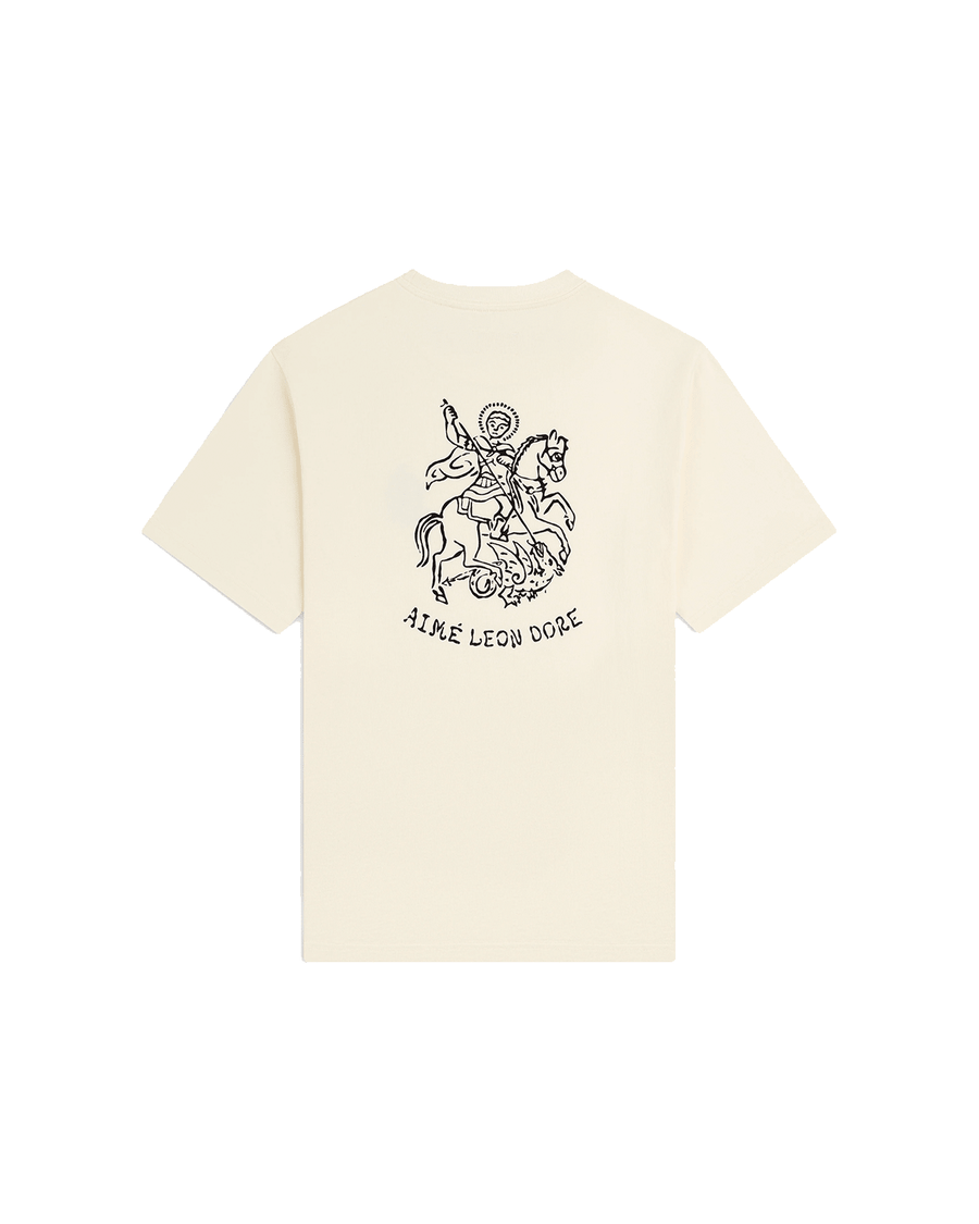 Camiseta Aimé Leon Dore Saint George Coconut Milk Bege