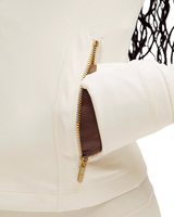 Vista frontal Jaqueta Lululemon Define Cropped Nulu Light Ivory/Gold/Gold Off White