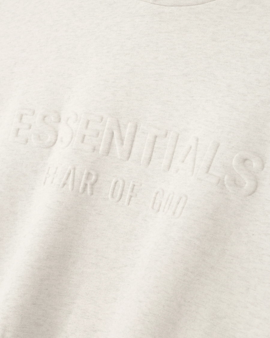Moletom Fear of God Essentials Heather Oatmeal Embossed Classic - Essentials - 