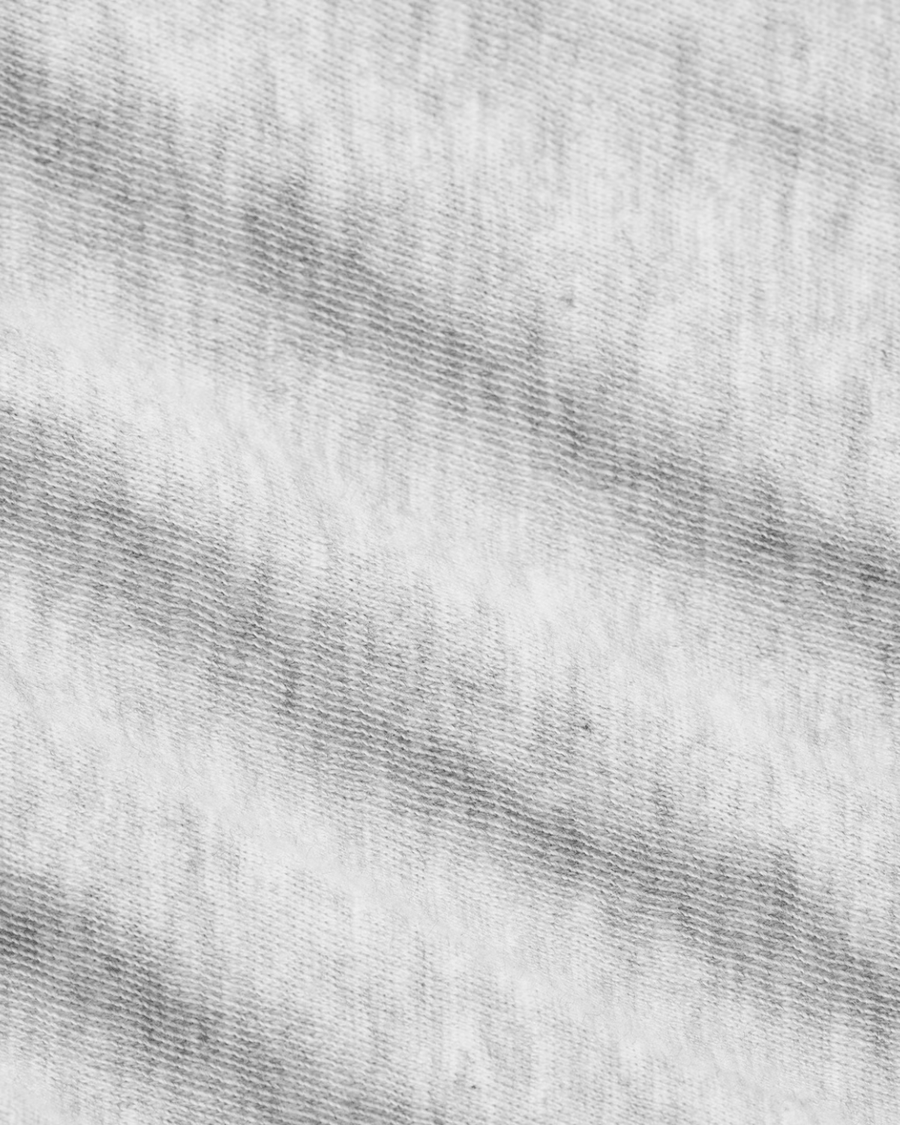 Vista frontal Polo Skims Baby Tee Worn in Jersey Light Heather Grey Cinza