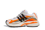 Vista lateral do Adidas Adidas Adistar Jellyfish Pharrell Williams Focus Olive Orange mostrando design do cabedal e logo da marca