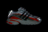 Vista em detalhe do Adidas Adidas Adistar Jellyfish Pharrell Williams Focus Olive Orange mostrando textura do material e acabamento