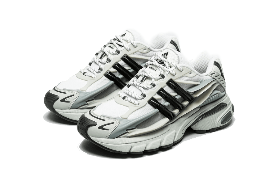 Vista lateral do Adidas Adidas Adistar Jellyfish Pharrell Williams Solid Grey Black mostrando design do cabedal e logo da marca