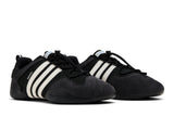 Vista traseira do Adidas Adidas Ballerina Bad Bunny Black Chalk mostrando calcanheira e detalhes do solado