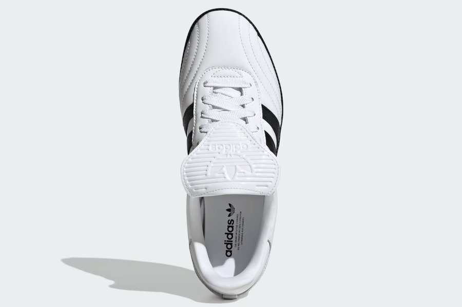 Vista traseira do Adidas Adidas Samba LT Cloud White Core Black Black Sole mostrando calcanheira e detalhes do solado