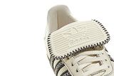 Vista na caixa do Adidas Adidas Samba LT Off White/Core Black/Gum mostrando embalagem original da marca