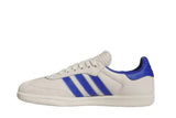 Vista lateral do Adidas adidas Samba x Humanrace Navy Aluminum mostrando design do cabedal e logo da marca