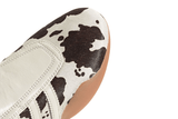 Vista na caixa do Adidas Adidas Taekwondo Mei Cow Print (Women's) Animal Print mostrando embalagem original da marca