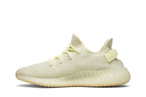 Vista lateral do Yeezy adidas Yeezy Boost 350 V2 Butter mostrando design do cabedal e logo da marca