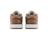 Vista frontal do Jordan Nike Air Jordan 1 Low Archaeo Brown White mostrando biqueira e costuras