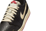 Vista do solado do Jordan Nike Air Jordan 1 Low OG x Nigel Sylvester Better With Time mostrando padrão de tração e tecnologia de amortecimento