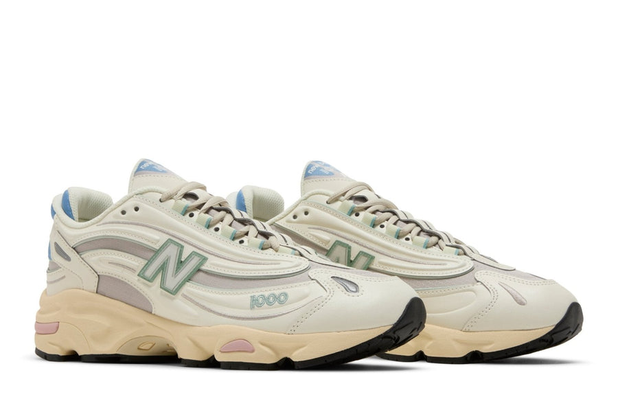 Vista frontal do New Balance New Balance 1000 Angora Moonrock mostrando biqueira e costuras