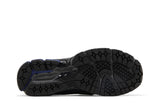 Vista traseira do New Balance New Balance 1906L Magnet mostrando calcanheira e detalhes do solado