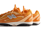 Vista traseira do New Balance New Balance 204L Kith Orange mostrando calcanheira e detalhes do solado