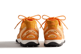 Vista do solado do New Balance New Balance 204L Kith Orange mostrando padrão de tração e tecnologia de amortecimento