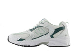 Vista lateral do New Balance New Balance 530 White Mint mostrando design do cabedal e logo da marca