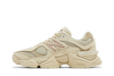 Vista lateral do New Balance New Balance 9060 Bone Sparrow mostrando design do cabedal e logo da marca