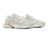 Vista em detalhe do New Balance New Balance 9060 Quartz Grey mostrando textura do material e acabamento