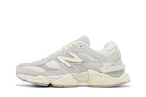 Vista lateral do New Balance New Balance 9060 Quartz Grey mostrando design do cabedal e logo da marca