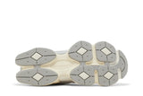 Vista traseira do New Balance New Balance 9060 Quartz Grey mostrando calcanheira e detalhes do solado