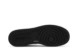 Vista traseira do Jordan Nike Air Jordan 1 Mid Tropical Twist Igloo (GS) mostrando calcanheira e detalhes do solado