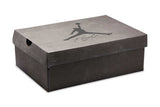 Vista na caixa do Jordan Nike Air Jordan 4 Cave Stone and Black mostrando embalagem original da marca