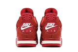 Vista frontal do Jordan Nike Air Jordan 4 Retro OG SP Brick By Brick Camurça Firewood mostrando biqueira e costuras