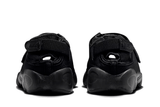 Vista do solado do Nike Nike Air Rift 'Triple Black' mostrando padrão de tração e tecnologia de amortecimento