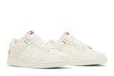 Vista frontal do Nike Nike Dunk Low Give Her Flowers mostrando biqueira e costuras