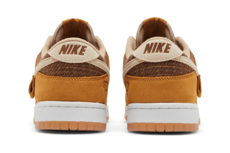 Vista frontal do Nike Nike Dunk Low Teddy Bear mostrando biqueira e costuras