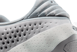 Vista na caixa do Nike Nike Mind 002 Light Smoke Grey mostrando embalagem original da marca