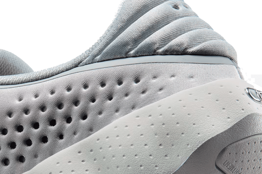 Vista na caixa do Nike Nike Mind 002 Light Smoke Grey mostrando embalagem original da marca