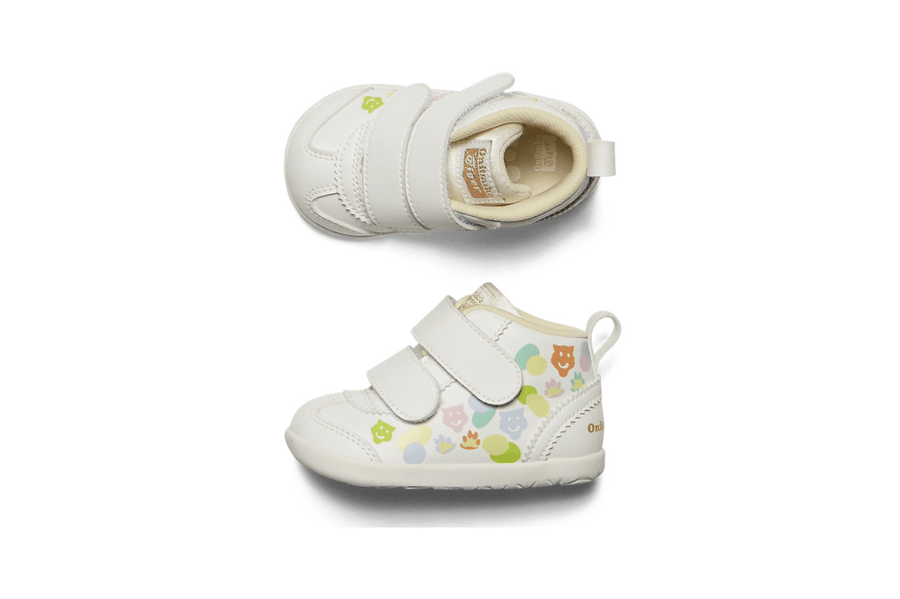 Vista em detalhe do Onitsuka Tiger Onitsuka Tiger Mexico 66 First Kids White/Huddle Yellow mostrando textura do material e acabamento