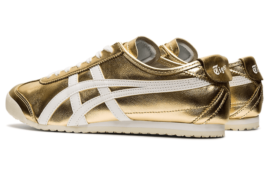 Vista frontal do Onitsuka Tiger Onitsuka Tiger Mexico 66 Gold White Dourado mostrando biqueira e costuras