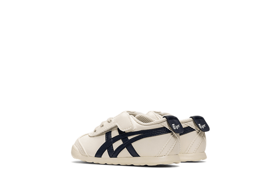 Vista traseira do Onitsuka Tiger Onitsuka Tiger Mexico 66 Kids Birch/Peacoat mostrando calcanheira e detalhes do solado
