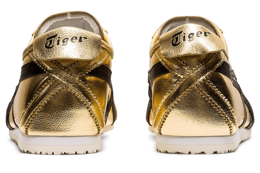 Vista frontal do Onitsuka Tiger Onitsuka Tiger Mexico 66 Pure Gold Black Dourado mostrando biqueira e costuras