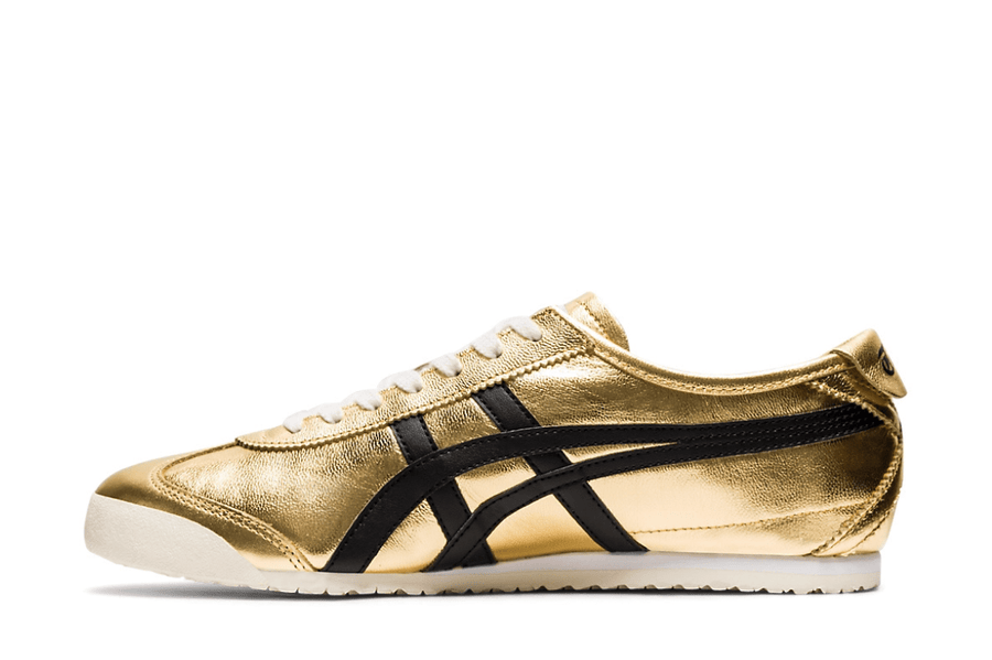 Vista lateral do Onitsuka Tiger Onitsuka Tiger Mexico 66 Pure Gold Black Dourado mostrando design do cabedal e logo da marca