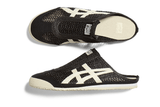 Vista do solado do Onitsuka Tiger Onitsuka Tiger Mexico 66 Sabot Black Cream mostrando padrão de tração e tecnologia de amortecimento