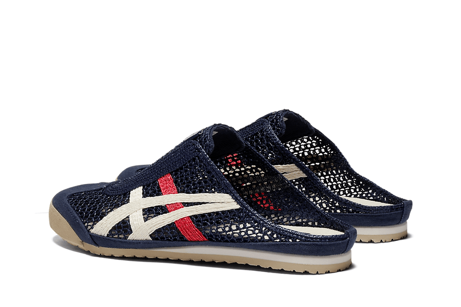 Vista lateral do Onitsuka Tiger Onitsuka Tiger Mexico 66 Sabot Iron Navy Cream mostrando design do cabedal e logo da marca