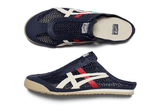 Vista do solado do Onitsuka Tiger Onitsuka Tiger Mexico 66 Sabot Iron Navy Cream mostrando padrão de tração e tecnologia de amortecimento