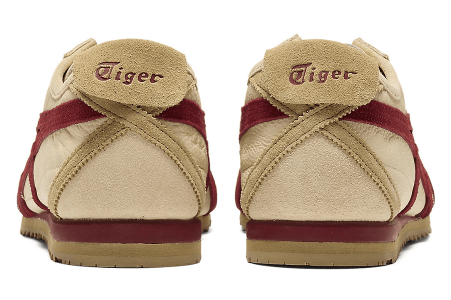 Vista do solado do Onitsuka Tiger Onitsuka Tiger Mexico 66 SD Beige Beet Juice mostrando padrão de tração e tecnologia de amortecimento