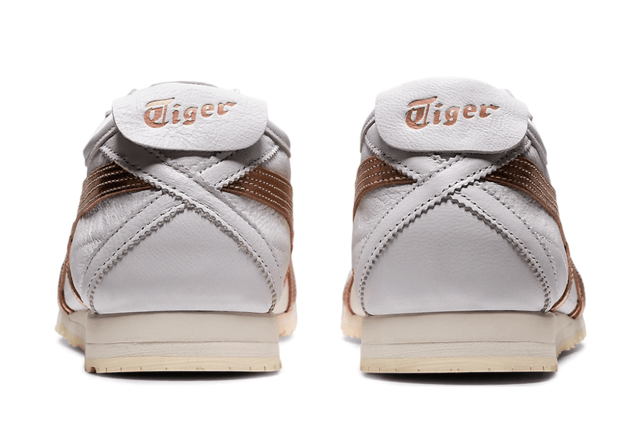 Vista frontal do Onitsuka Tiger Onitsuka Tiger Mexico 66 SD White/Rose Gold mostrando biqueira e costuras
