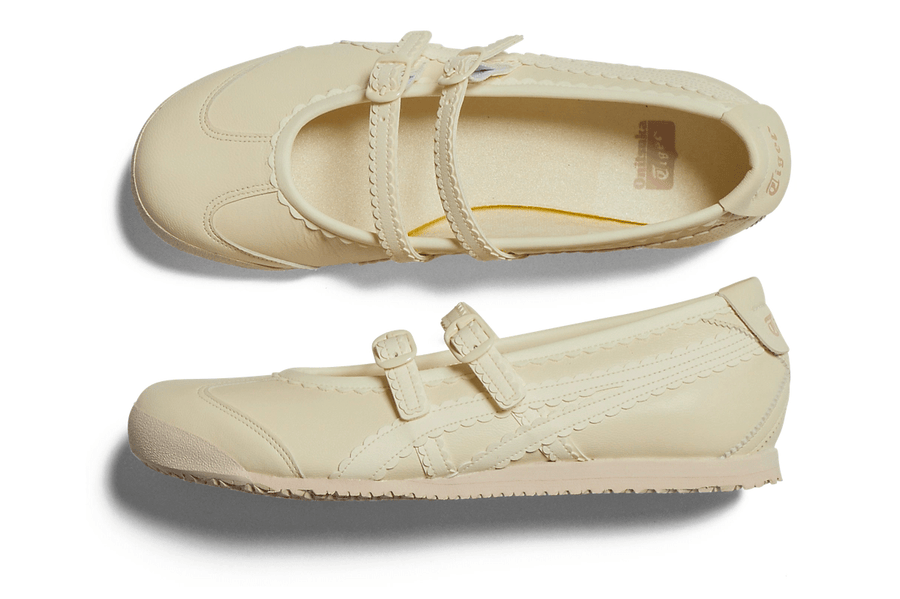 Vista do solado do Onitsuka Tiger Onitsuka Tiger Mexico 66 TGRS Ivory/Cream mostrando padrão de tração e tecnologia de amortecimento